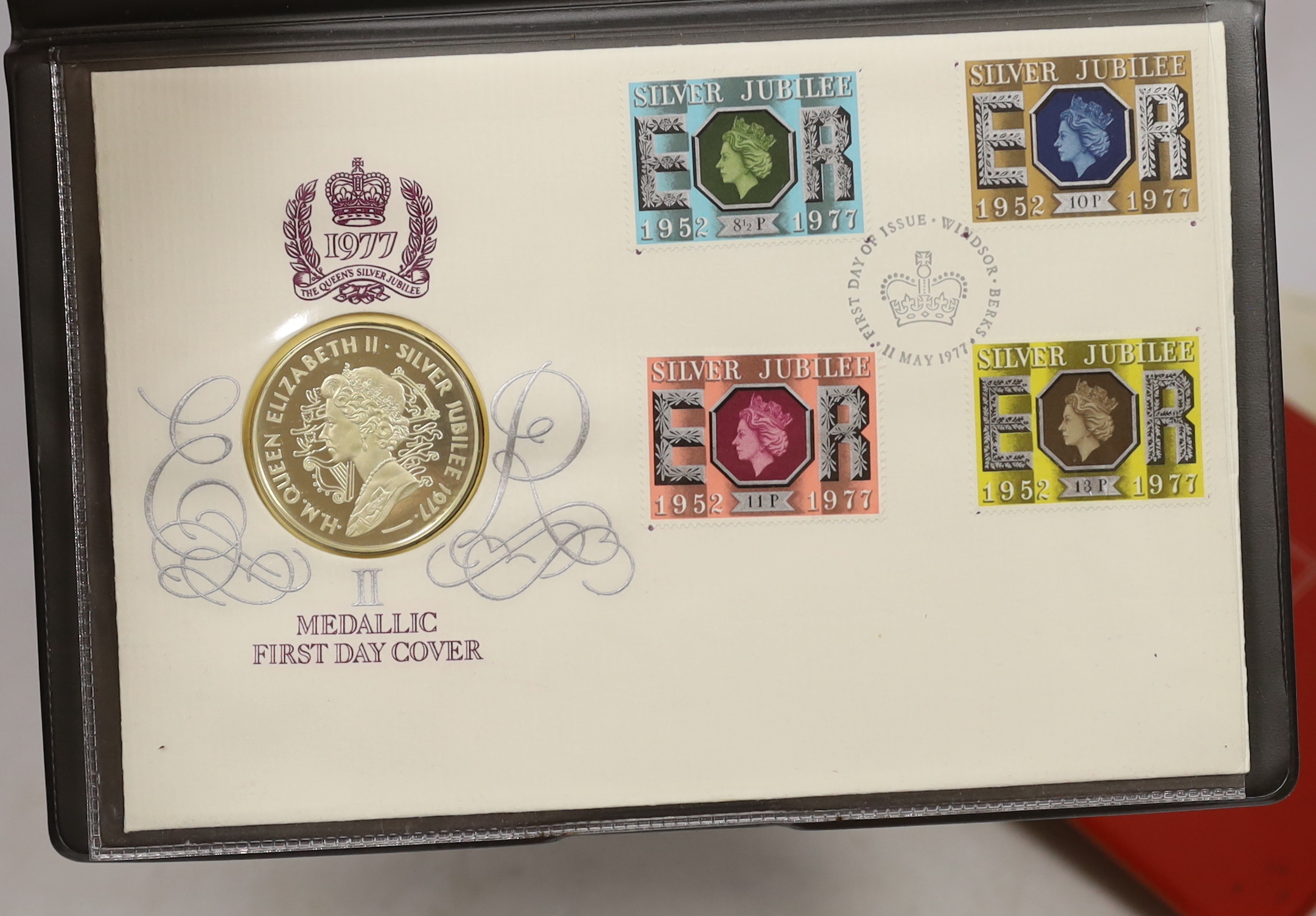 Queen Elizabeth II 1977 Silver Jubilee issues - two medallic first day covers, two cases of South Atlantic Coronation Crowns, cased Isle of Man proof silver coin set for 1977 and a silver gilt dish